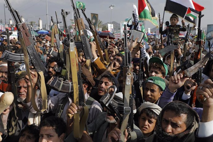 September 6, 2024, Sanaa, Sanaa, Yemen: Houthi followers hold guns as the people take part in an anti-Israel and anti-U.S. demonstration in Sanaa. OSAMAH YAHYA