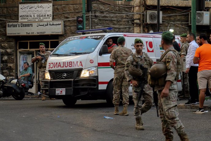 17 September 2024, Lebanon, Beirut: Lebanese army soldiers secure the area for an ambulance to enter the premises of the American University hospital. Eight people have been killed and some 2,750 injured in suspected coordinated explosions of hand-held te