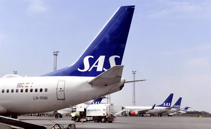 Archivo - Aviones de la aerolínea SAS en el aeropuerto de Estocolmo.