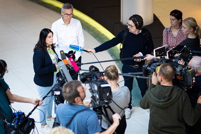 10 September 2024, Lower Saxony, Hanover: Thorsten Groeger, District Director of IG Metall in Lower Saxony and Saxony-Anhalt, and Daniela Cavallo, Chairwoman of the General and Group Works Council of Volkswagen AG, speak during a press conference. Germa