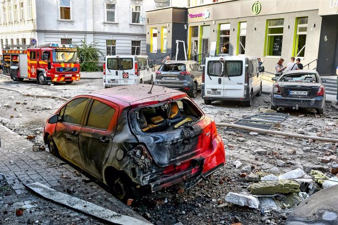 September 4, 2024, Lviv, Ukraine: LVIV, UKRAINE - SEPTEMBER 4, 2024 - A fire-stricken car is in the street in the Zaliznychnyi district after the Russian missile attack, Lviv, western Ukraine. In the early hours of Wednesday, September 4, Russian invaders