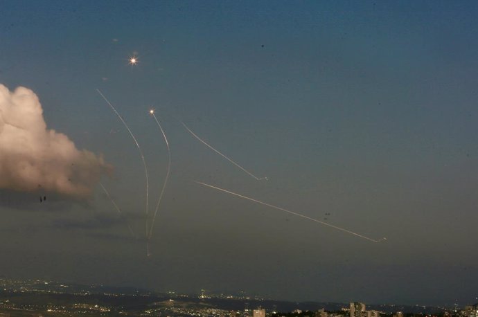 HAIFA, Sept. 23, 2024  -- An Israeli aerial defense system launches missiles to intercept rockets fired from Lebanon, in northern Israel, on Sept. 23, 2024. On Monday night, Hezbollah broadened its rocket fire range, targeting Haifa for the first time sin