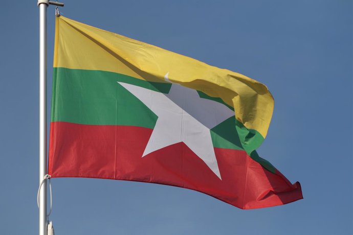 September 25, 2024, Saint Petersburg, Russia: The national flag of the Republic of the Union of Myanmar, fluttering in the wind on a flagpole in Saint Petersburg, Russia.