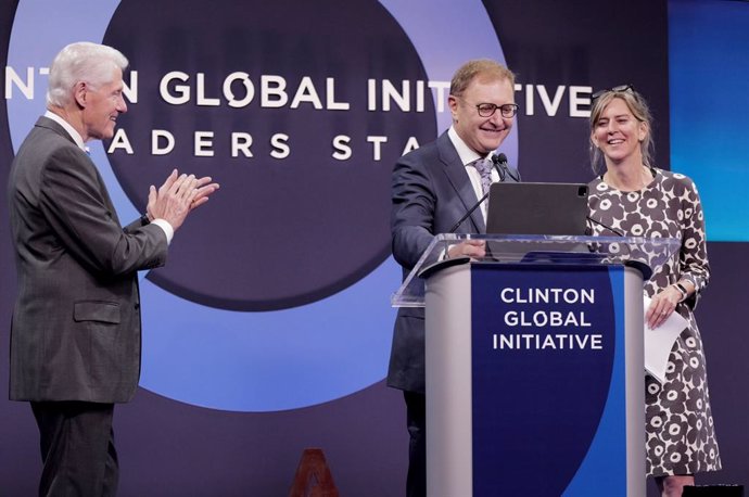 (From Left To Right, President Bill Clinton, Ziv Aviram, Susanne Rust)