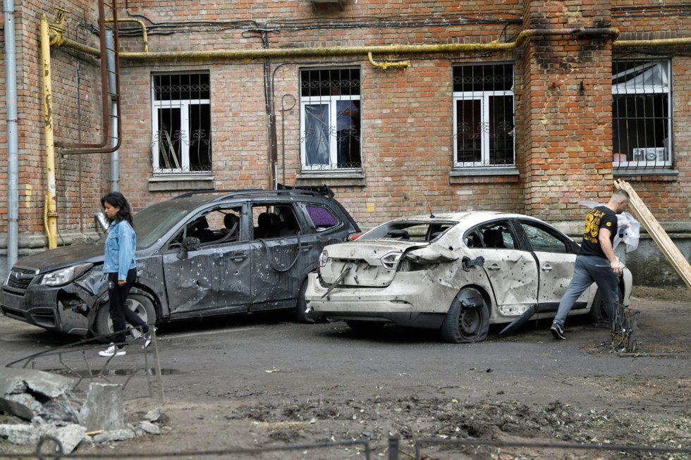 26 September 2024, Ukraine, Kiev: Cars are seen damaged by falling wreckage of a downed Russian Shahed drone in the Pechersk district of Kiev, capital of Ukraine. Photo: -/Ukrinform/dpa