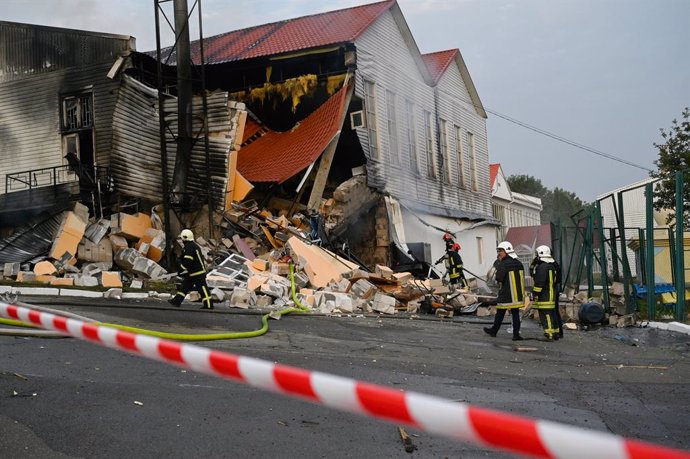 September 2, 2024, Kyiv, Ukraine: Rescuers extinguish a fire in the destroyed gym of the International Academy of Personnel Management, which suffered from a missile attack by the Russian Army in Kyiv. Russian Army inflicted a missile blow on the capital 