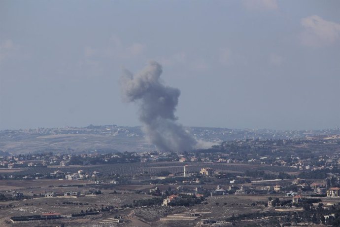 NABATIEH, Sept. 30, 2024  -- This photo taken on Sept. 29, 2024 shows smoke rising following an Israeli airstrike in Nabatieh, Lebanon. At least 18 people were killed and 30 others injured early Sunday in Israeli air strikes on dozens of towns and village