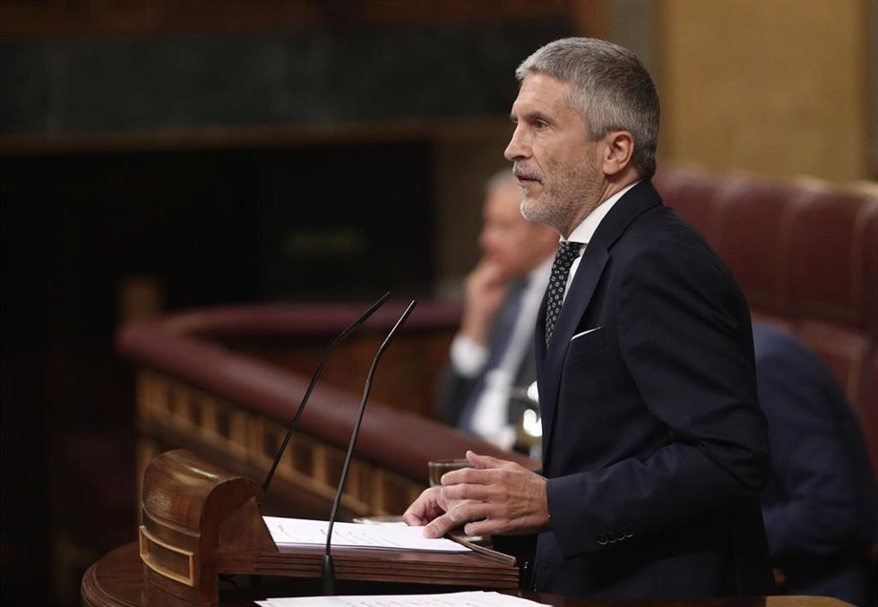 Archivo - El ministro del Interior, Fernando Grande-Marlaska, interviene durante la sesión plenaria celebrada en el Congreso de los Diputados en el que se debate el proyecto de ley de Impuesto sobre transacciones financieras, la conocida como 'Tasa Tobi