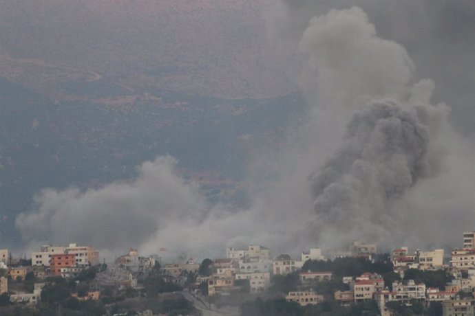 LEBANESE BORDER, Sept. 30, 2024  -- Smoke rises following Israeli airstrikes on the border area in southeastern Lebanon, on Sept. 30, 2024. Israel's Security Cabinet on Monday night approved "the next phase" of the military operation in Lebanon as Israeli