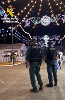 Guardias civiles en la Feria de La Algaba (Sevilla).