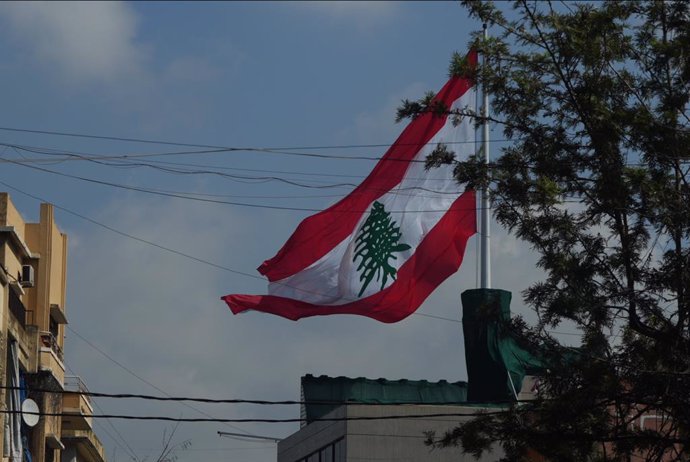 September 29, 2024, Beirut, Bierut, Lebanon: Lebonie flag flies above the city despite the constant Israeli drones flying over Bierut and dropping bombs on its southern suburbs.