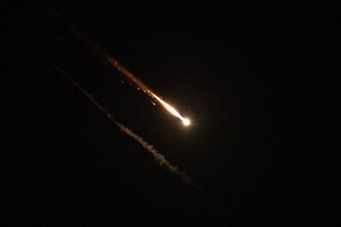 JERUSALEM, Oct. 1, 2024  -- A projectile from Iran intercepted by Israel flies through the sky above Jerusalem, on Oct. 1, 2024. The Israeli military said in a statement on Tuesday that Iran fired about 100 missiles at Jerusalem and Israel in the evening.