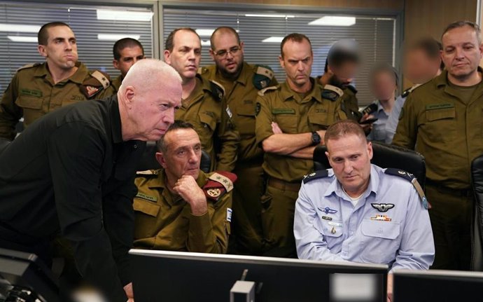 BEIJING, Sept. 28, 2024  -- Israeli Defense Minister Yoav Gallant (1st L, front), Israel's military chief Herzi Halevi (2nd L, front) and other officers are seen at the Israeli Air Force's underground command room during the airstrike targeting Hezbollah'