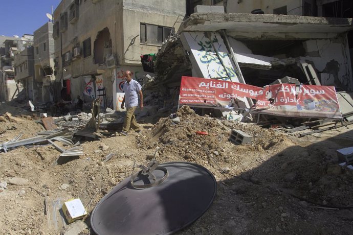 September 12, 2024, Tulkarem, West Bank, Palestinian Territory: Palestinians walk amid the devastation following an Israeli army raid in Tulkarem in the north of the occupied-West Bank, on September 15, 2024