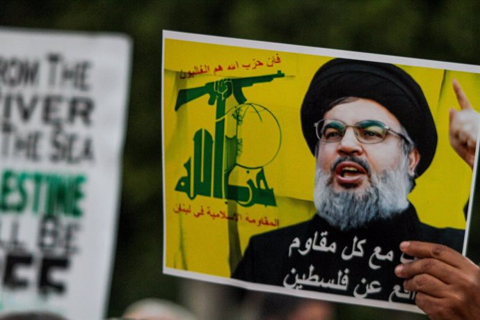 October 2, 2024, Tunis, Tunisia: Tunis, Tunisia. 02 October 2024. Several images of late Hezbollah Secretary General Hassan Nasrallah are raised during a protest outside the Municipal theatre in Tunis in support of Palestinians and the Lebanese people ami