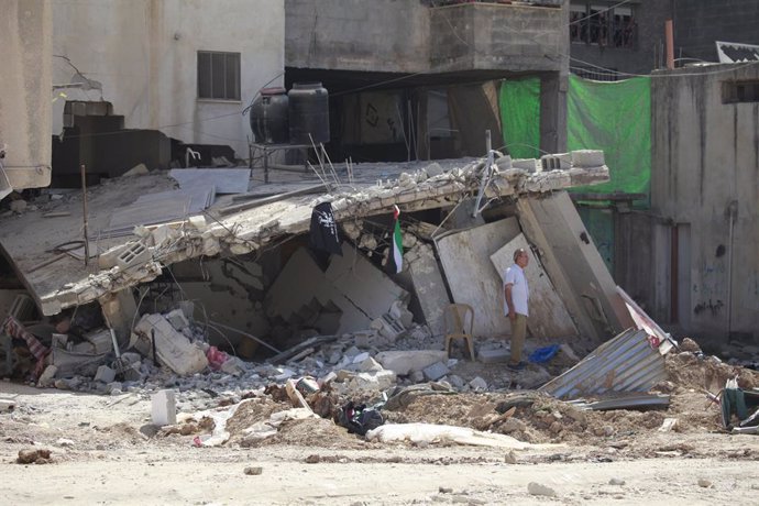 September 12, 2024, Tulkarem, West Bank, Palestinian Territory: Palestinians walk amid the devastation following an Israeli army raid in Tulkarem in the north of the occupied-West Bank, on September 15, 2024