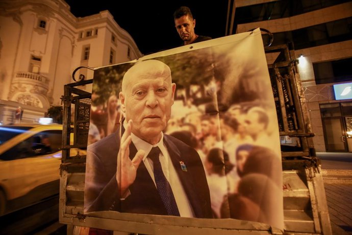 October 4, 2024, Tunis, Tunisia: Tunis, Tunisia. 04 October 2024. A large image of President Kais Saied is raised at a demonstration in support of the Tunisian President in Habib Bourguiba Avenue in the Tunisian capital. Participants chanted their suppo