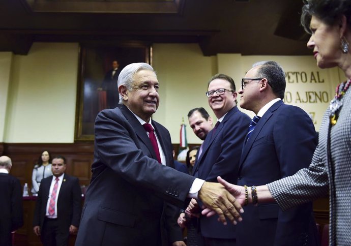 Archivo - 11 December 2019, Mexico, Mexico City: Mexican President Andres Manuel Lopez Obrador (L) arrives to attend the first report of the President of the Supreme Court of Justice of the Nation Arturo Zaldivar Lelo de Larrea. Photo: -/NOTIMEX/dpa