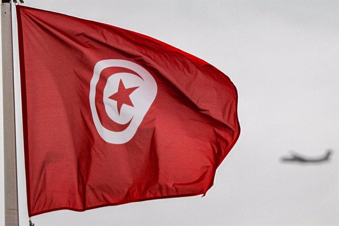 October 3, 2024, Tunis, Tunisia: Tunis, Tunisia. 03 October 2024. The Tunisian flag at the Tunis Carthage Airport as Tunisians arrive at Tunis after leaving Lebanon. Foreign nationals fled Lebanon on Thursday as governments worldwide urged their citizens 