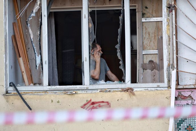 October 9, 2024, Odesa Region, Ukraine: ODESA REGION, UKRAINE - OCTOBER 9, 2024 - A man stands on the balcony of a residential building damaged by a Russian drone attack on Chornomorsk, Odesa region, southern Ukraine