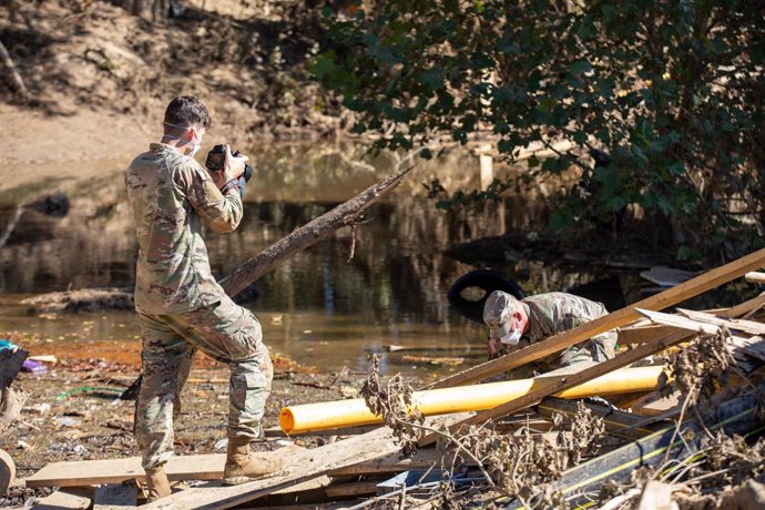 October 10, 2024, Erwin, Tn, United States: U.S. Army soldiers collect soil samples to check for contamination from floods in the aftermath of Hurricane Helene, October 10, 2024 in Erwin, Tennessee.