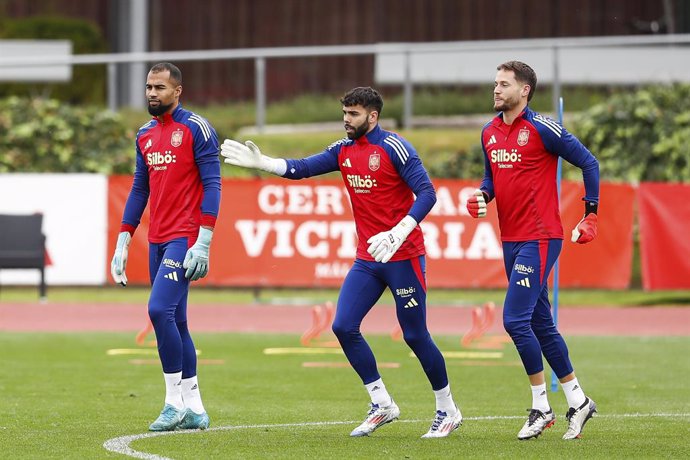 Robert Sanchez, David Raya and Alex Remiro of Spain, warm up during a training session prior to the Spanish national soccer team's UEFA Nations League match against Serbia, at Ciudad del Futbol, on October 14, 2024, in Las Rozas, Madrid, Spain.