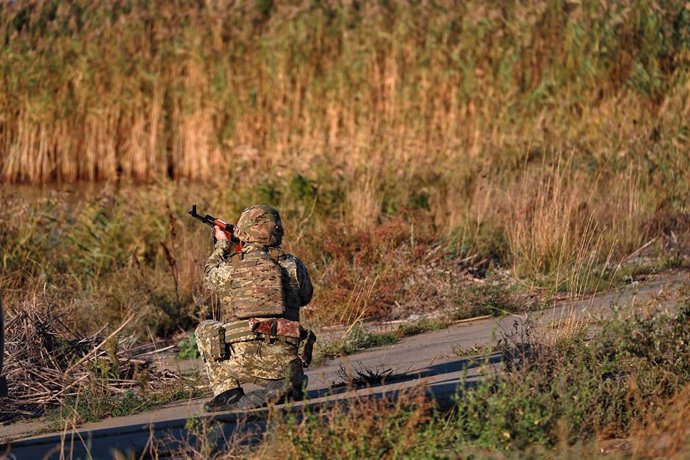 October 10, 2024, Odesa Region, Ukraine: ODESA REGION, UKRAINE - OCTOBER 10, 2024 - A serviceman of a mobile fire group of the State Border Guard Service of Ukraine aims a rifle while on a mission in Odesa region, southern Ukraine.