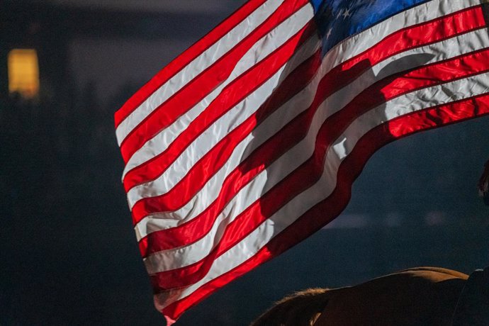 September 21, 2024, Upper Marlboro, Maryland, U.S: PARIS WILBURD of Austin, ARK holds the American Flag during the colors of the 40th annual Bill Pickett invitational rodeo championship finals at the Show Place Arena in Upper Marlborough, Maryland Marylan