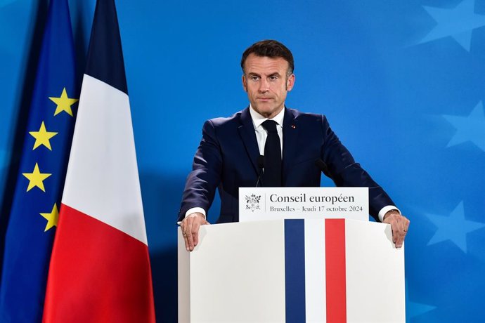 HANDOUT - 17 October 2024, Belgium, Brussels: French President Emmanuel Macron speaks during a press conference after attending the extraordinary summit of European Union heads of state and government. Photo: Gaetan Claessens/EU Council/dpa - ATTENTION: e