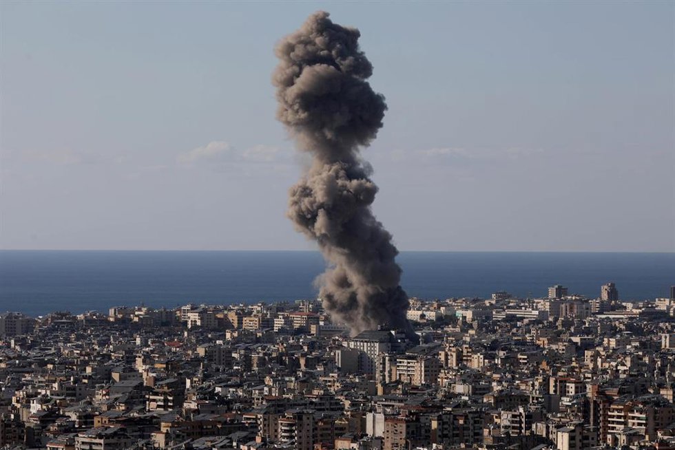 BEIRUT, Oct. 20, 2024  -- Smoke billows following Israeli airstrikes in the southern suburb of Beirut, Lebanon, Oct. 19, 2024.   The death toll from Israeli airstrikes on Lebanon since the beginning of the Israel-Hezbollah conflict has reached 2,448, wi