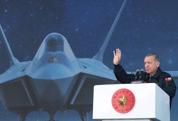 HANDOUT - 01 May 2023, Turkey, Kahramankazan: Turkish President Recep Tayyip Erdogan delivers a speech during "the Century of the Future" event at the headquarters of the Turkish Aerospace Industries to introduce its national combat fifth-generation 