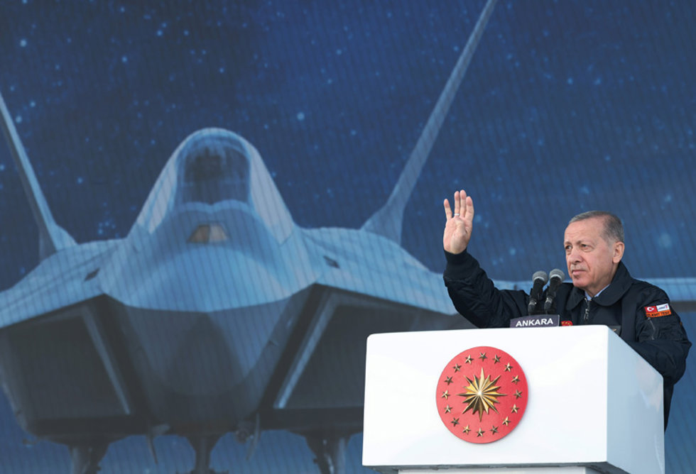 HANDOUT - 01 May 2023, Turkey, Kahramankazan: Turkish President Recep Tayyip Erdogan delivers a speech during "the Century of the Future" event at the headquarters of the Turkish Aerospace Industries to introduce its national combat fifth-generation