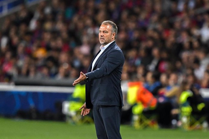 23 October 2024, Spain, Barcelona: Barcelona coach Hansi Flick reacts on the sidelines during the UEFA Champions League soccer match between FC Barcelona and Bayern Munich at the Olympic Stadium. Photo: Sven Hoppe/dpa