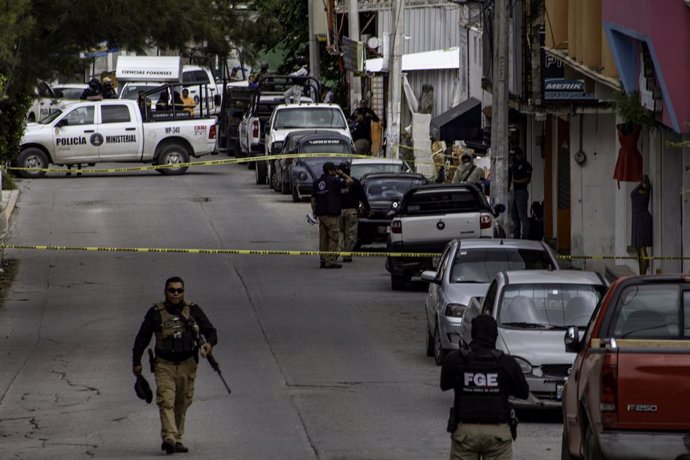 October 9, 2024, Chilpancingo, Guerrero, Mexico: Mexican police officers and investigators fill the streets after an attack. A man was killed and a woman was injured in an armed attack east of Chilpancingo, Guerrero. The victims were traveling on Avenida 