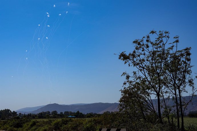 ROSH PINA, Oct. 21, 2024  -- Projectiles from Lebanon intercepted by Israel are pictured as seen from Hula Valley, northern Israel, on Oct. 20, 2024. Hezbollah said in separate statements that its fighters targeted several Israeli sites with rockets and d