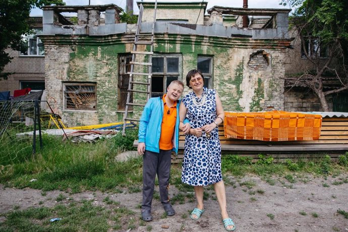 Olga y su hijo Artem, de 14 años y con síndrome de Down