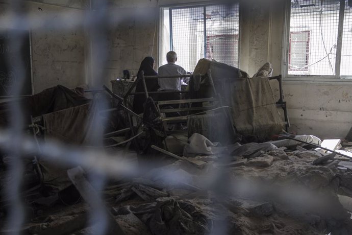 GAZA, Oct. 20, 2024  -- Palestinians are seen inside the Asmaa School in the al-Shati refugee camp in northern Gaza Strip after an Israeli airstrike, on Oct. 19, 2024. An Israeli warplane attacked the Asmaa School housing displaced people in the al-Shati 