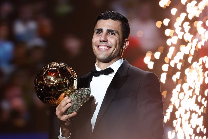 28 October 2024, France, Paris: Manchester City's Spanish midfielder Rodri receives the Ballon d'Or during the 2024 Ballon d'Or award ceremony at the Theatre du Chatelet. Photo: Franck Fife/AFP/dpa