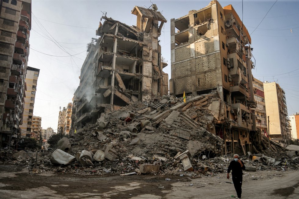 09 November 2024, Lebanon, Beirut: A man walks past buildings that were destroyed in Israeli air strikes Beirut's southern suburb. More than a dozen Israeli attacks hit Beirut's southern suburb, a stronghold of pro-Iranian Hezbollah, overnight.