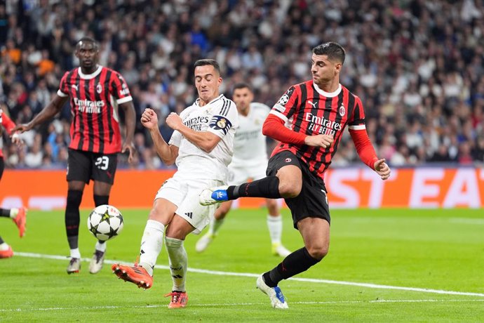 Alvaro Morata of AC Milan and Lucas Vazquez of Real Madrid in action during the UEFA Champions League 2024/25 League Phase MD4 match between Real Madrid CF and AC Milan at Estadio Santiago Bernabeu on November 5, 2024, in Madrid, Spain.