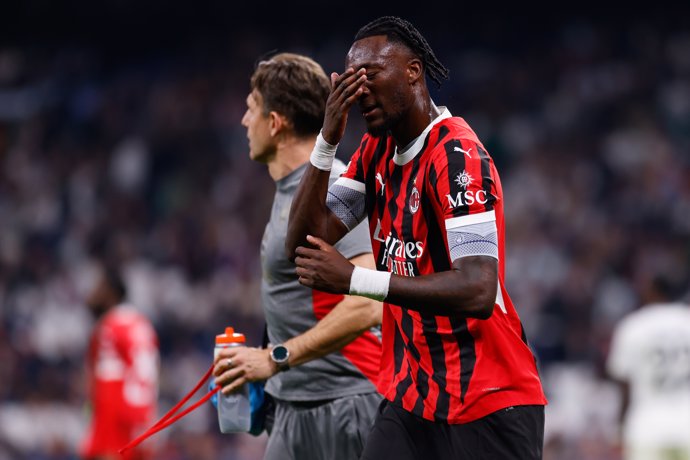 Tammy Abraham of AC Milan hurts during the UEFA Champions League 2024/25 League Phase MD4 match between Real Madrid CF and AC Milan at Estadio Santiago Bernabeu on November 5, 2024, in Madrid, Spain.