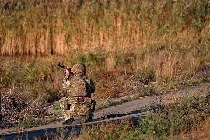 October 10, 2024, Odesa Region, Ukraine: ODESA REGION, UKRAINE - OCTOBER 10, 2024 - A serviceman of a mobile fire group of the State Border Guard Service of Ukraine aims a rifle while on a mission in Odesa region, southern Ukraine.