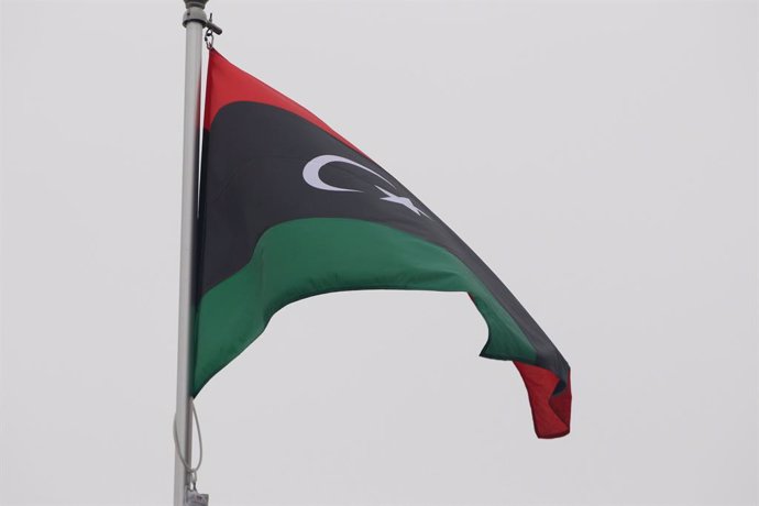 October 10, 2024, Saint Petersburg, Russia: The national flag of the Republic of Libya, fluttering in the wind on a flagpole in Saint Petersburg, Russia.