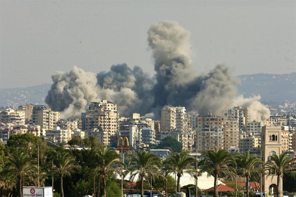 TYRE, Nov. 1, 2024  -- The photo shows the smoke caused by Israeli airstrikes in Tyre, Lebanon, on Oct. 31, 2024. Israeli airstrikes on eastern and southern Lebanon killed 24 people and injured 19 others on Thursday, according to official and military s