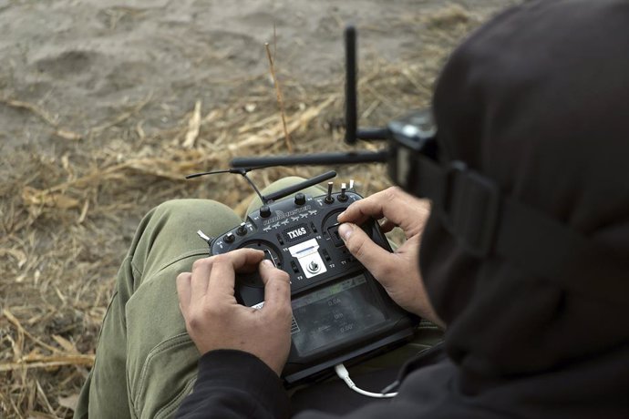 October 12, 2024, Kharkiv Region, Ukraine: KHARKIV REGION, UKRAINE - OCTOBER 12, 2024 - A 57th Otaman Kost Hordiienko Motorized Brigade drone operator launches a UAV in preparation for a combat mission, Kharkiv region, northeastern Ukraine.