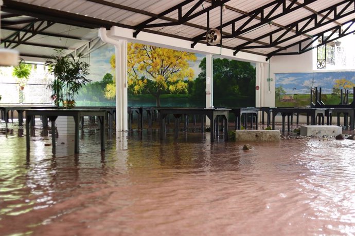 Archivo - May 20, 2022, Villavicencio, Meta, Colombia: A restaurant flooded inside as people of Villavicencio, Colombia react and stay in shelters after the Guatiquia river overflowed its banks due to rains affecting 1200 families and at least 45 houses t