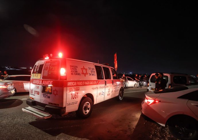 JERUSALEM, Oct. 14, 2024  -- An ambulance is seen near the site of a Hezbollah's drone attack in the town of Binyamina, northern Israel, on Oct. 13, 2024. Four soldiers were killed in a drone attack on a military base in northern Israel Sunday evening, th