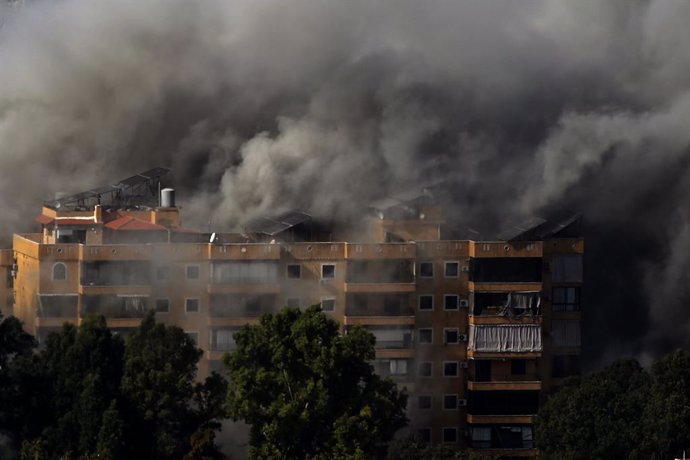 November 12, 2024, Beirut, Beirut, Lebanon: Smoke of Israeli air raid engulfs a building at Beirut southern suburb. The Israeli military pounded Beirut's southern suburb with airstrikes mounting one of its heaviest daytime attacks yet on the Hezbollah-con