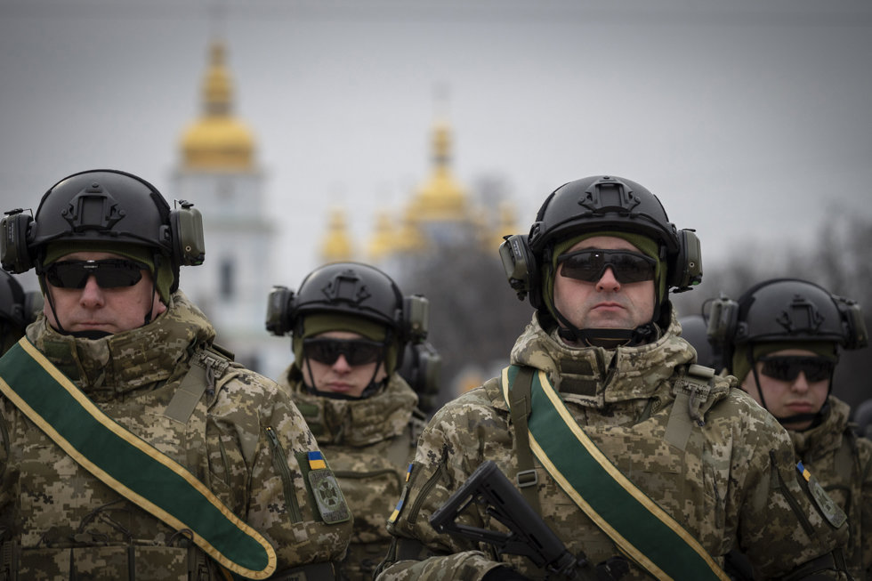 HANDOUT - 24 February 2023, Ukraine, Kiev: Ukrainian soldiers attend a state event on the first anniversary of the Russian invasion of Ukraine.