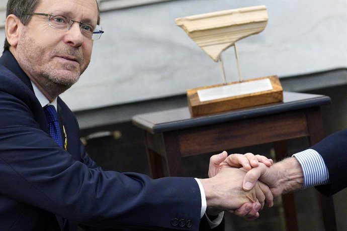 November 12, 2024, Washington, District Of Columbia, USA: President Isaac Herzog of Israel shakes hands with United States President Joe Biden, as they meet in the Oval Office of the White House in Washington, DC on November 12, 2024